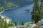 Emerald Bay, SOUTH LAKE TAHOE, CA - July 22, 2015: Emerald Bay State Park is located at the southern end of Lake Tahoe California which is a National Natural Landmark. Within the park you"u2019ll find Eagle Falls, Vikingsholm mansion, and trails that take you to Desolation Wilderness. In the photo you can see Fannette island.